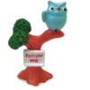 Miniature Owl On Tree